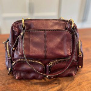 Tod's Burgundy Leather Handbag with Gold Hardware